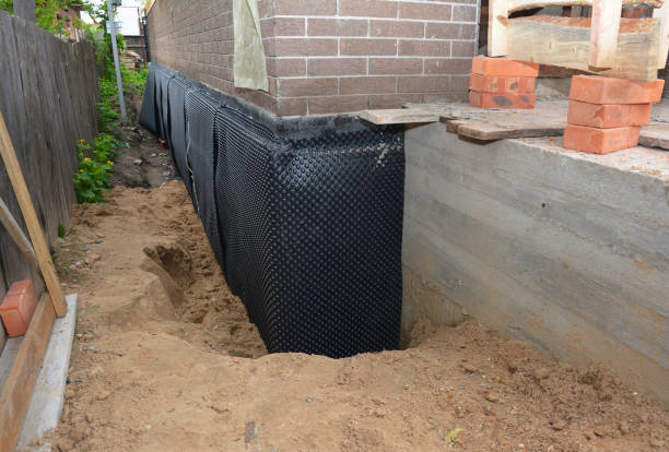 SJ Waterproofing Pros technician performing targeted Sump Pump Installation assessment in Line Lexington, PA